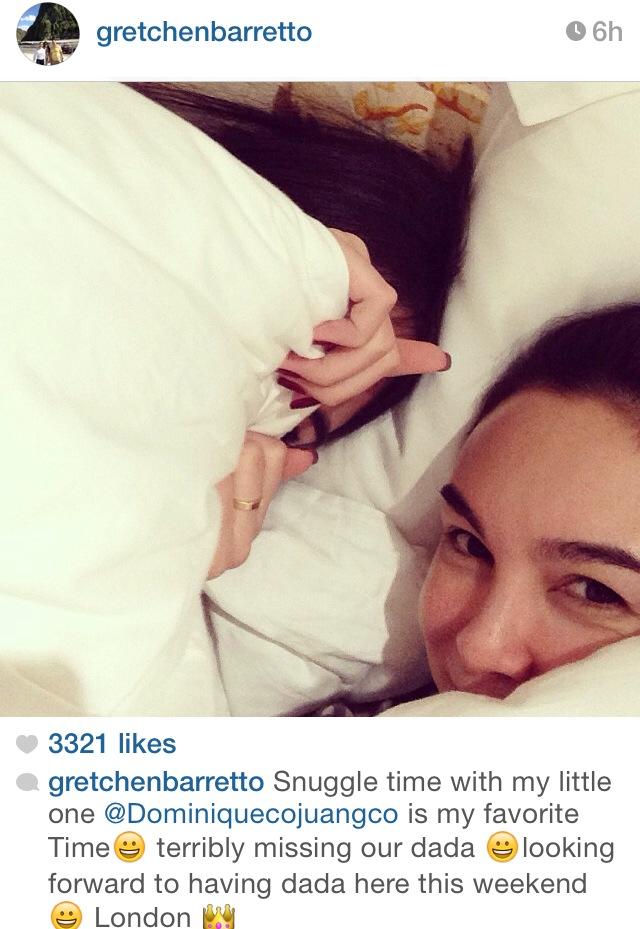 Gretchen snuggling with her little one Dominique in London